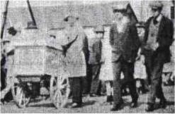 Front Street and Pennar Regattas were a feature of Summer life. Mr Giovanni Monti (right, with  flat cap and ice cream cart) provided refreshment